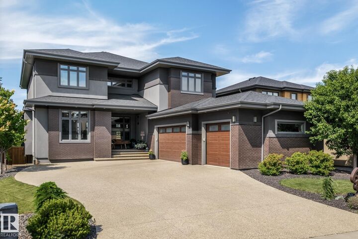 Property Photo: 699 Howatt Drive SW AB T6W 3K3