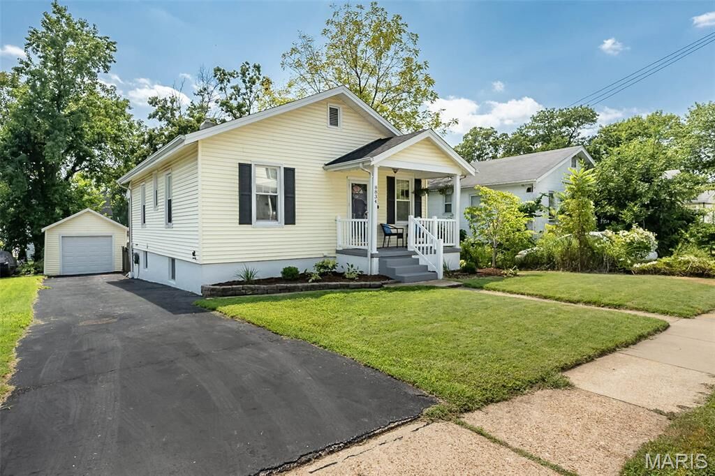 Property Photo:  8834 Pine Avenue  MO 63144 