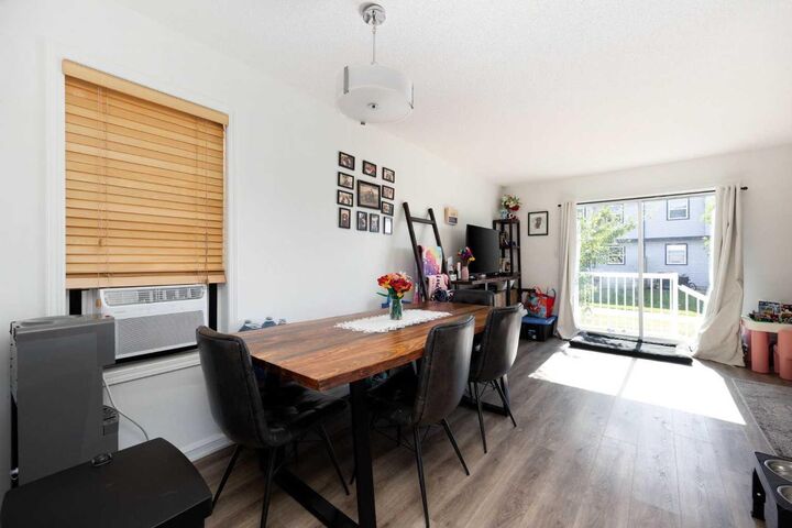 Property Photo: 100 St. Laurent Way 70 AB T9K 2R4