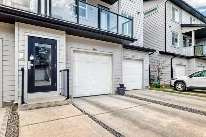 Property Photo:  120 Redstone  NE 203  AB T3N 1M6 