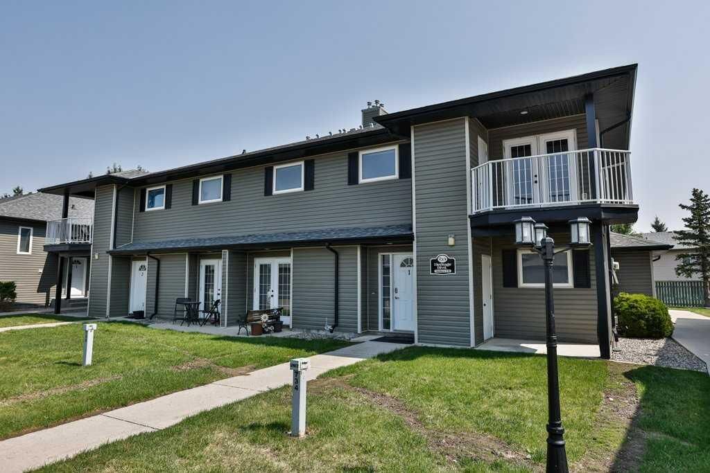 Property Photo:  734 Heritage Boulevard W 5  AB T1K 7Z5 