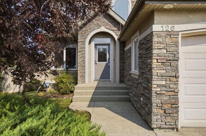 Property Photo: 126 Evercreek Bluffs Road SW AB T2Y 4P7