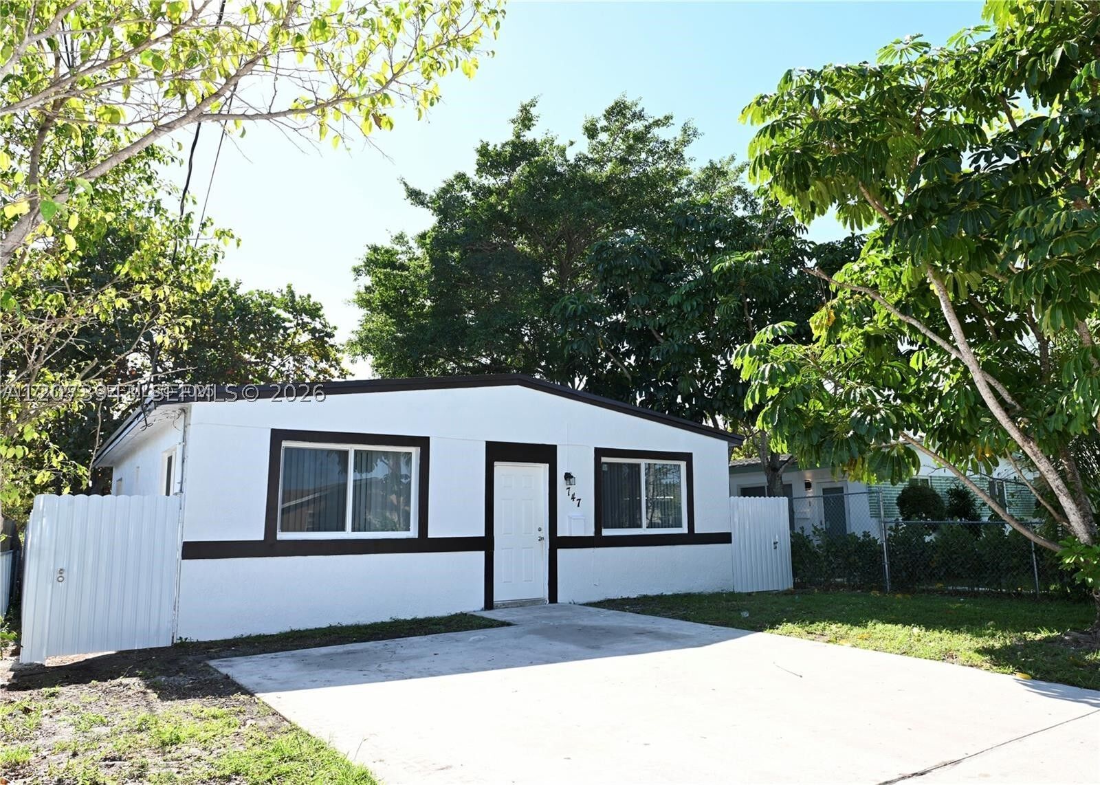 Property Photo:  747 NW 5th Ct  FL 33009 