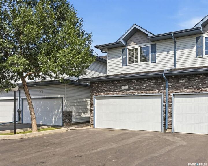 Property Photo:  110 Dulmage Crescent 7  SK S7T 0C7 