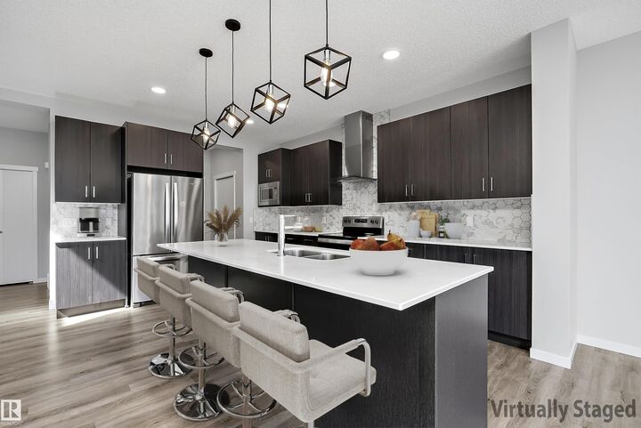 Property Photo:  9227 223 Street NW  AB T5T 7M1 