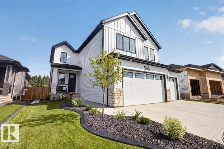 Property Photo: 94 Harvest Crescent AB T8E 0A8