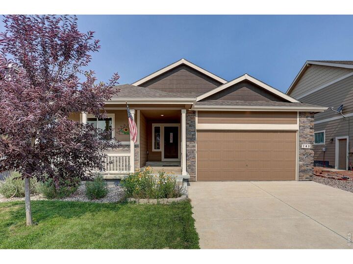 Property Photo:  703 Cavern St  CO 80550 