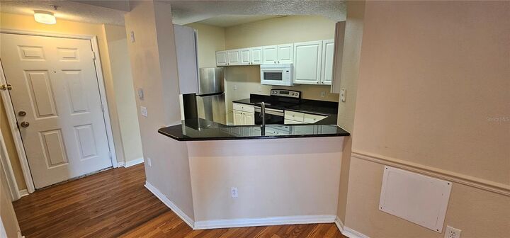 Property Photo: 5578 Metrowest Boulevard 1-310 FL 32811