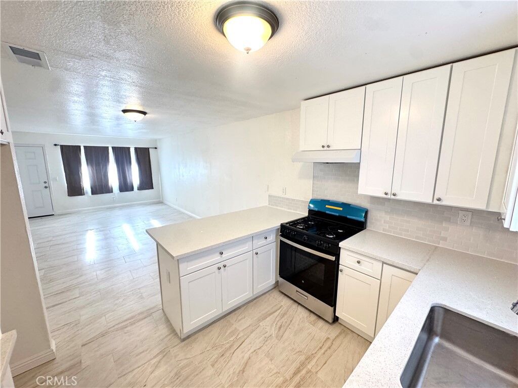 Property Photo:  16214 Juniper Street 2B  CA 92345 