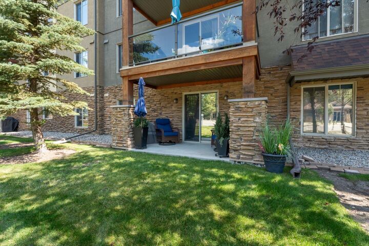 Property Photo:  92 Crystal Shores Road 2113  AB T1S 2M4 