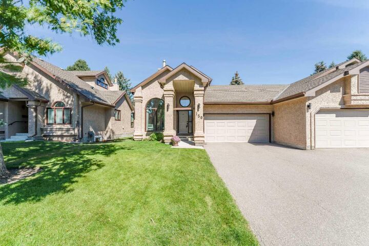 150 Oakbriar Close SW — photo 1