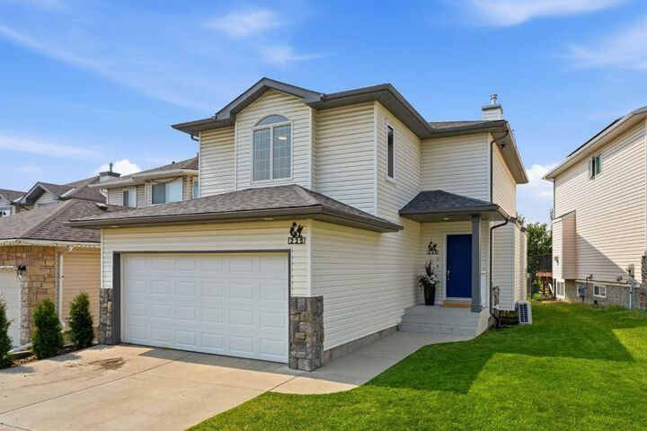 235 Arbour Stone Place NW — photo 1