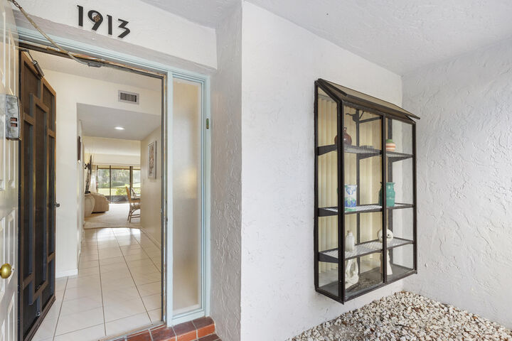 Property Photo: 5186 Golfview Court 1913 FL 33484