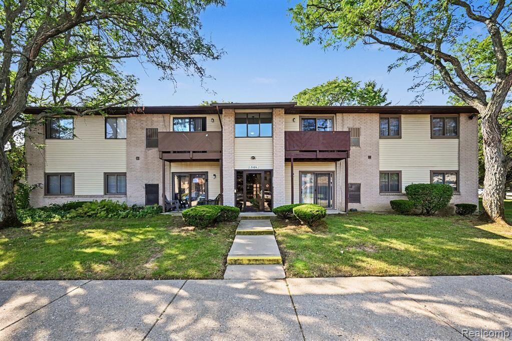 Property Photo:  7494 Manor Circle 104  MI 48185 