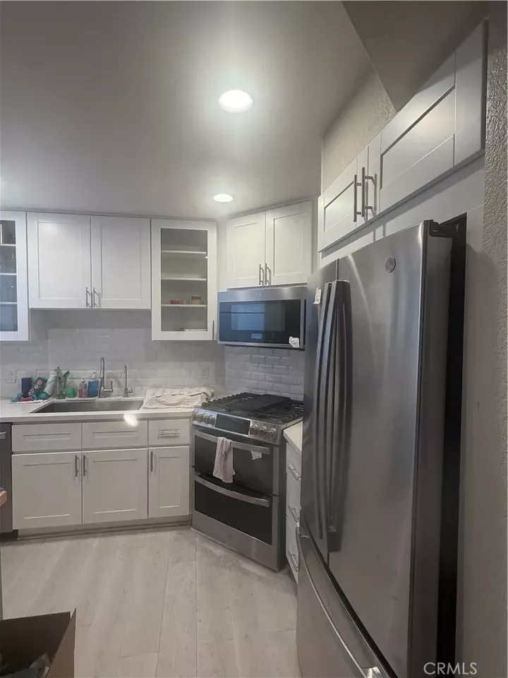 Property Photo:  1751 E 68th 12  CA 90805 