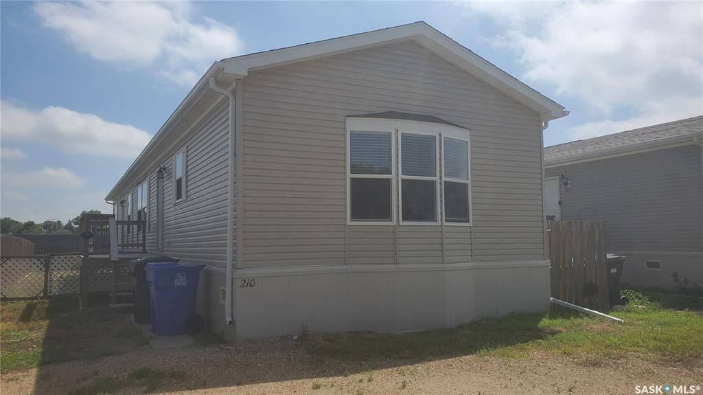 Property Photo:  210 Brownlee Street  SK S4H 3P4 