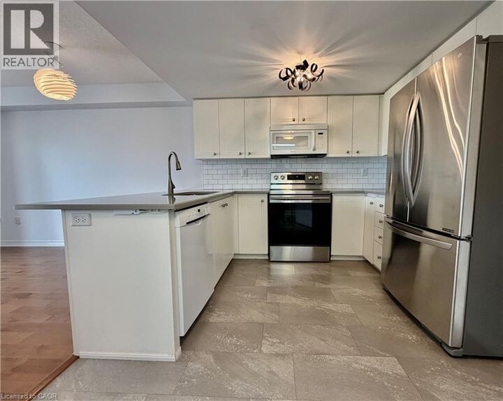 Property Photo:  19 Waterford Drive 401  ON N1L 0G8 