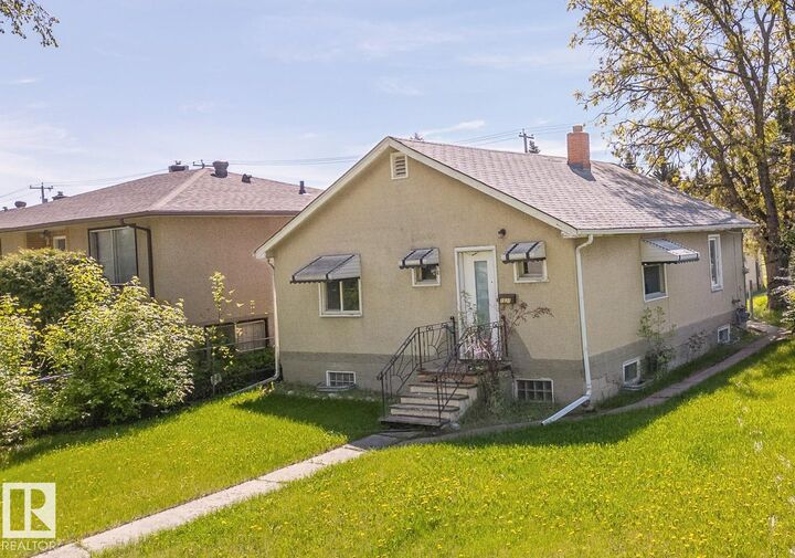 Property Photo:  7931 83 Avenue NW  AB T6C 0M1 