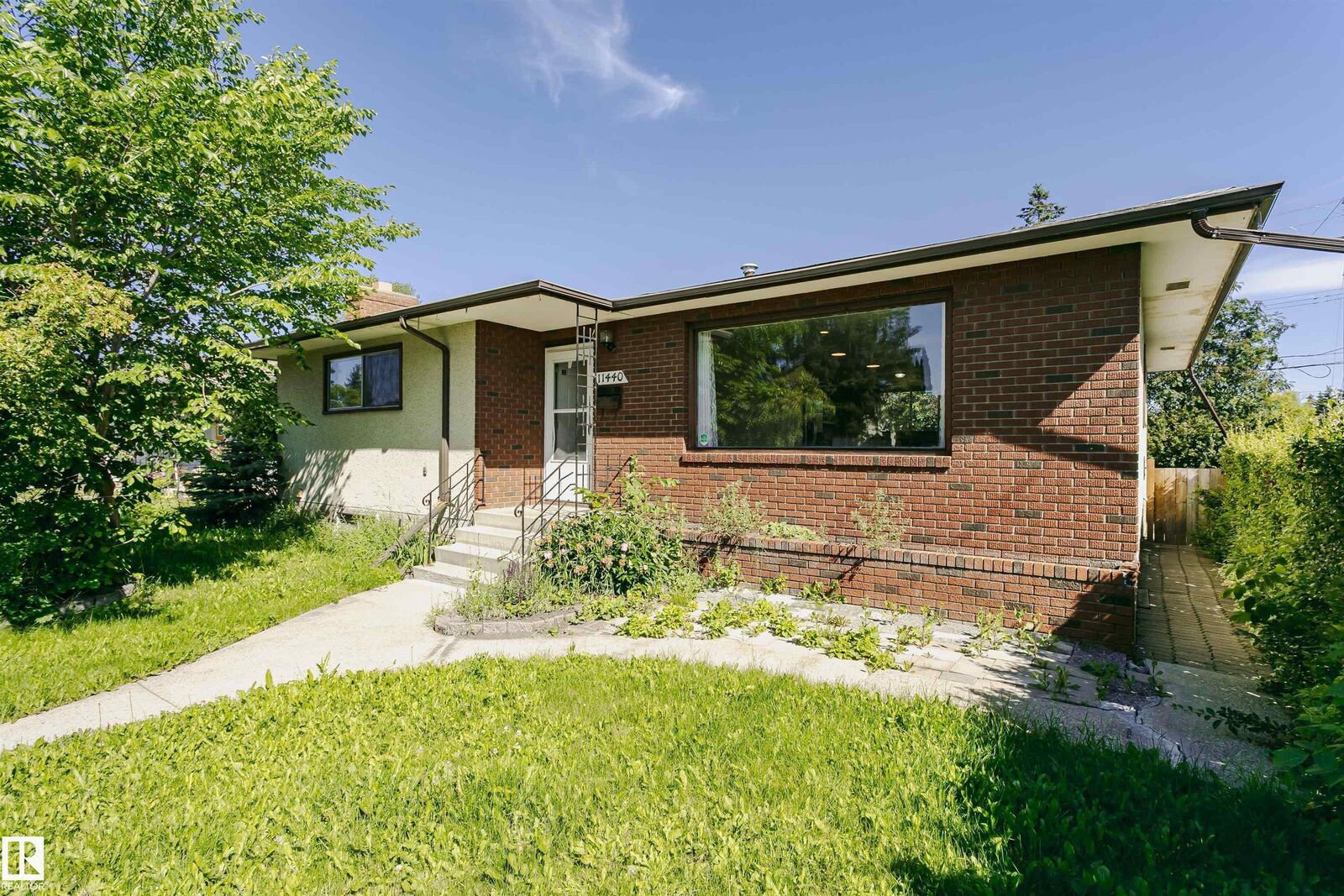 Property Photo: 11440 44A Avenue NW AB T6J 0Z9