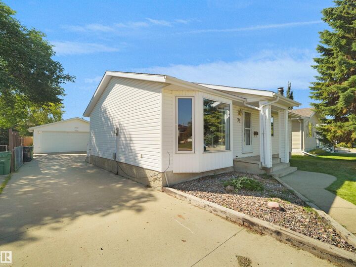 Property Photo:  71 South Park Drive  AB T9E 4X5 