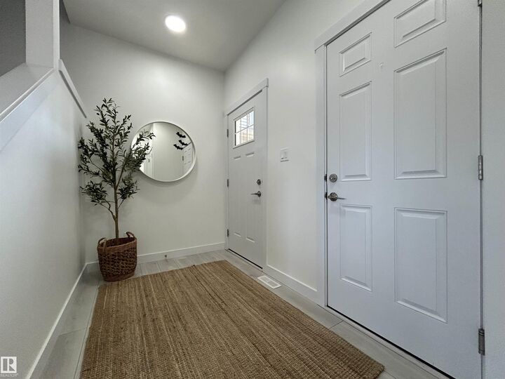 Property Photo:  19728 29 Avenue NW  AB T6M 1M2 