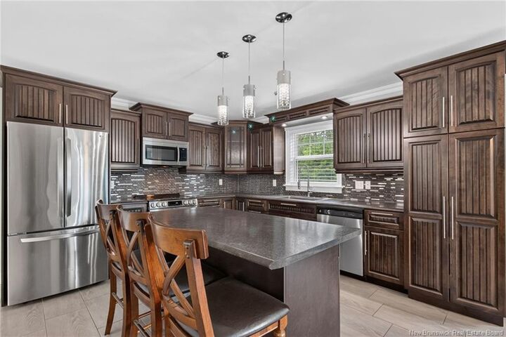 Property Photo:  302 Lady Russell  NB E1E 0G1 