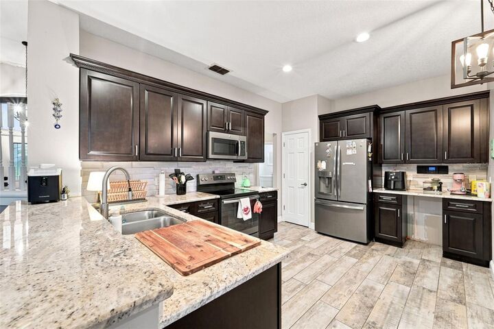 Property Photo: 3874 Gatlin Place Circle FL 32812