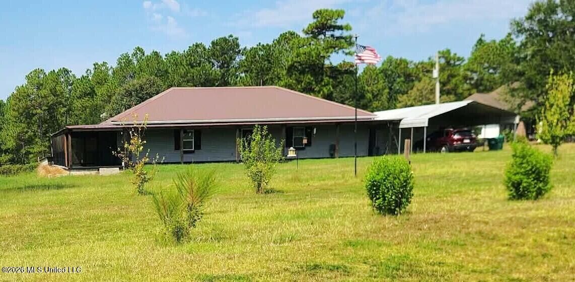 Property Photo:  27588 E Lake Cypress Dr  MS 39573 
