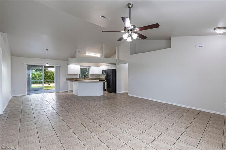 Property Photo:  520 NW 24th Ave  FL 33993 