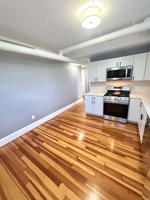 Property Photo:  840 Massachusetts Ave 19  MA 02476 