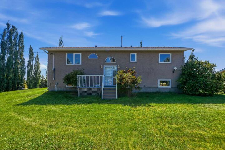 Property Photo:  241081 Township Road 232  AB T1P 0N7 