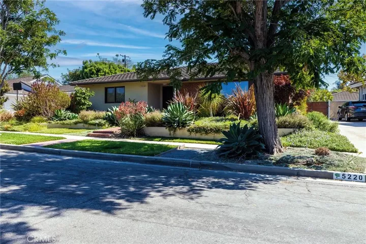 Property Photo: 5220 E Los Flores CA 90815