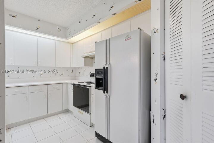 Property Photo: 13701 SW 12th St 311A FL 33027