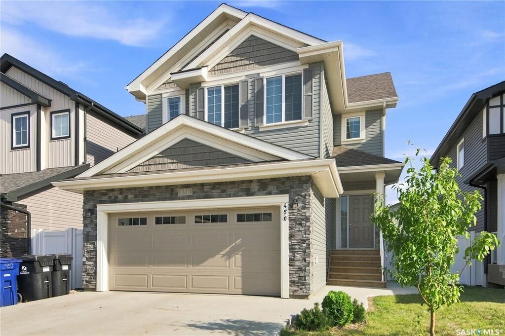 Property Photo: 450 Aniskotaw Way SK S7V 1M3
