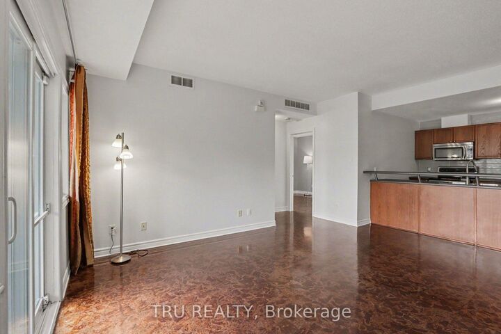 Property Photo:  165 Waterbridge Drive 7  ON K2G 7G3 