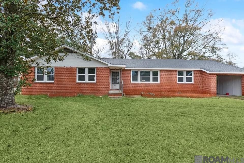 Property Photo: 11665 Troy St LA 70811