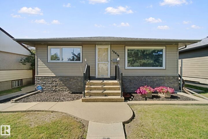 Property Photo:  12916 63 Street NW  AB T5A 0W3 