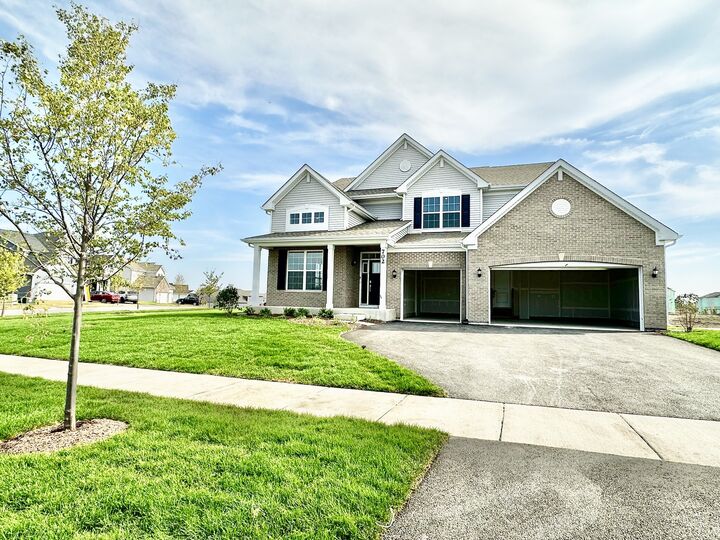 Property Photo:  702 West Point Way  IL 60543 