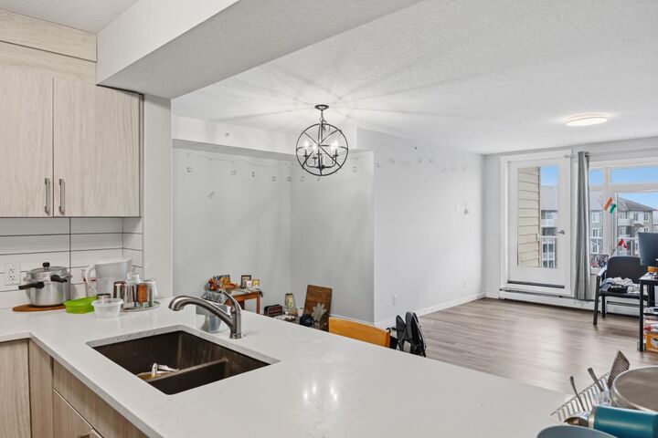 Property Photo:  6118 80 Avenue NE 2402  AB T3J 0S6 