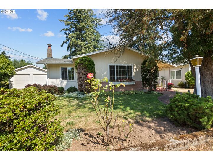 Property Photo:  10737 NE Shaver St  OR 97220 