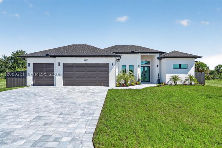 Property Photo:  1327 NE 23rd St  FL 33909 