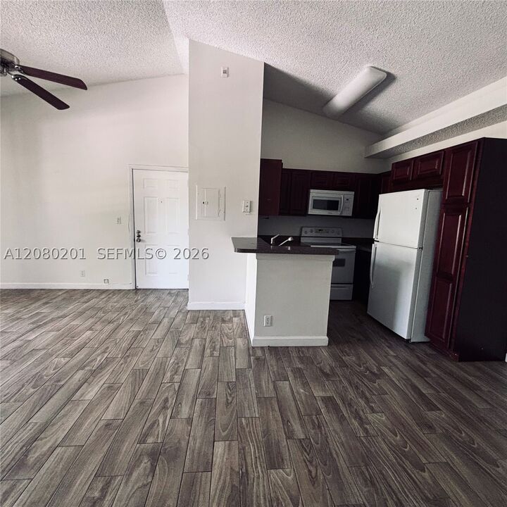 Property Photo: 701 Lyons Rd 13207 FL 33063