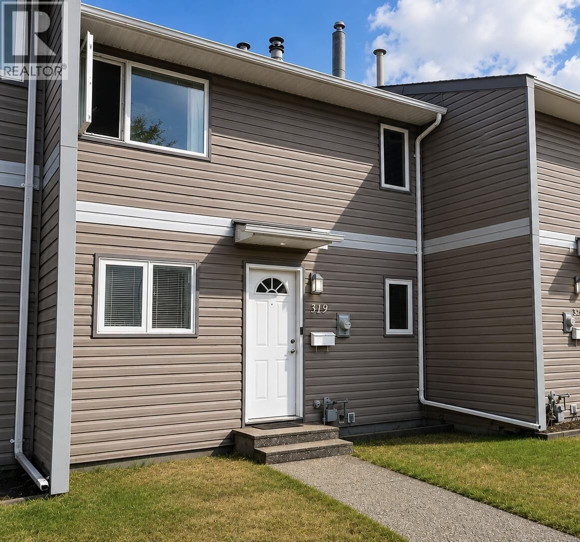 Property Photo:  2550 Ospika Boulevard 319  BC V2N 3T2 
