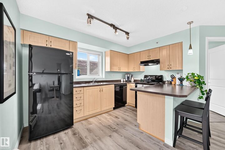 Property Photo:  11449 Ellerslie Road SW 401  AB T6W 1T2 