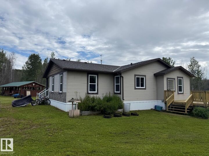 Property Photo:  56509 Hwy 32  AB T7E 3X8 