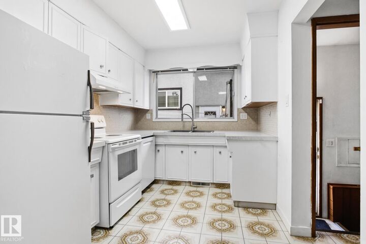 Property Photo:  13235 82 Street NW  AB T5E 2T9 