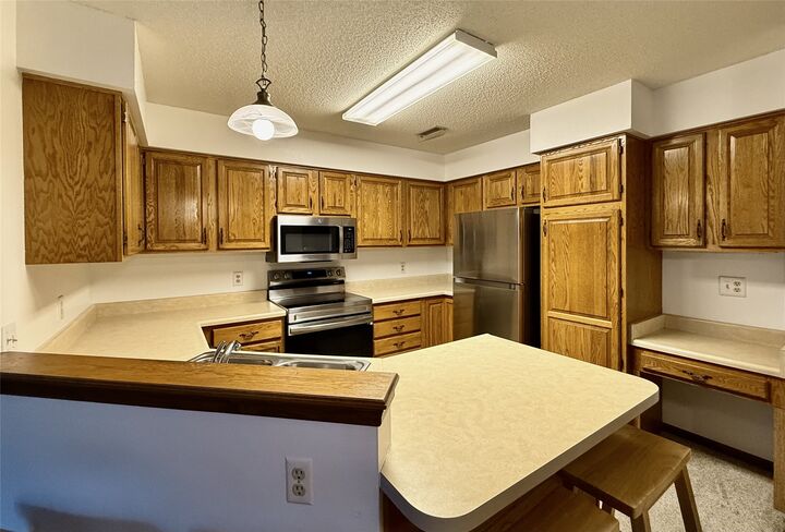 Property Photo: 401 SE Delaware Avenue 205 IA 50021