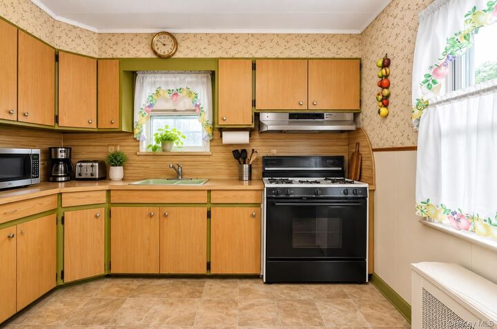 Property Photo:  114-31 210th Street  NY 11411 