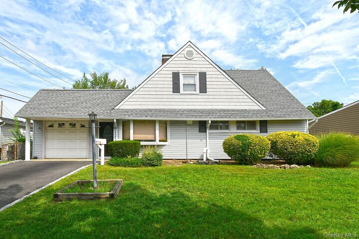 Property Photo: 5 Woodcock Lane NY 11756