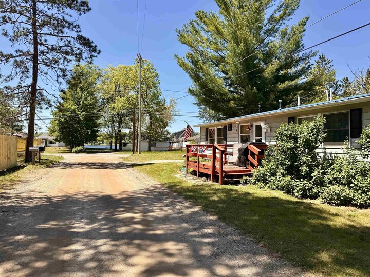 Property Photo:  4997 Lucinda Drive  MI 48756 